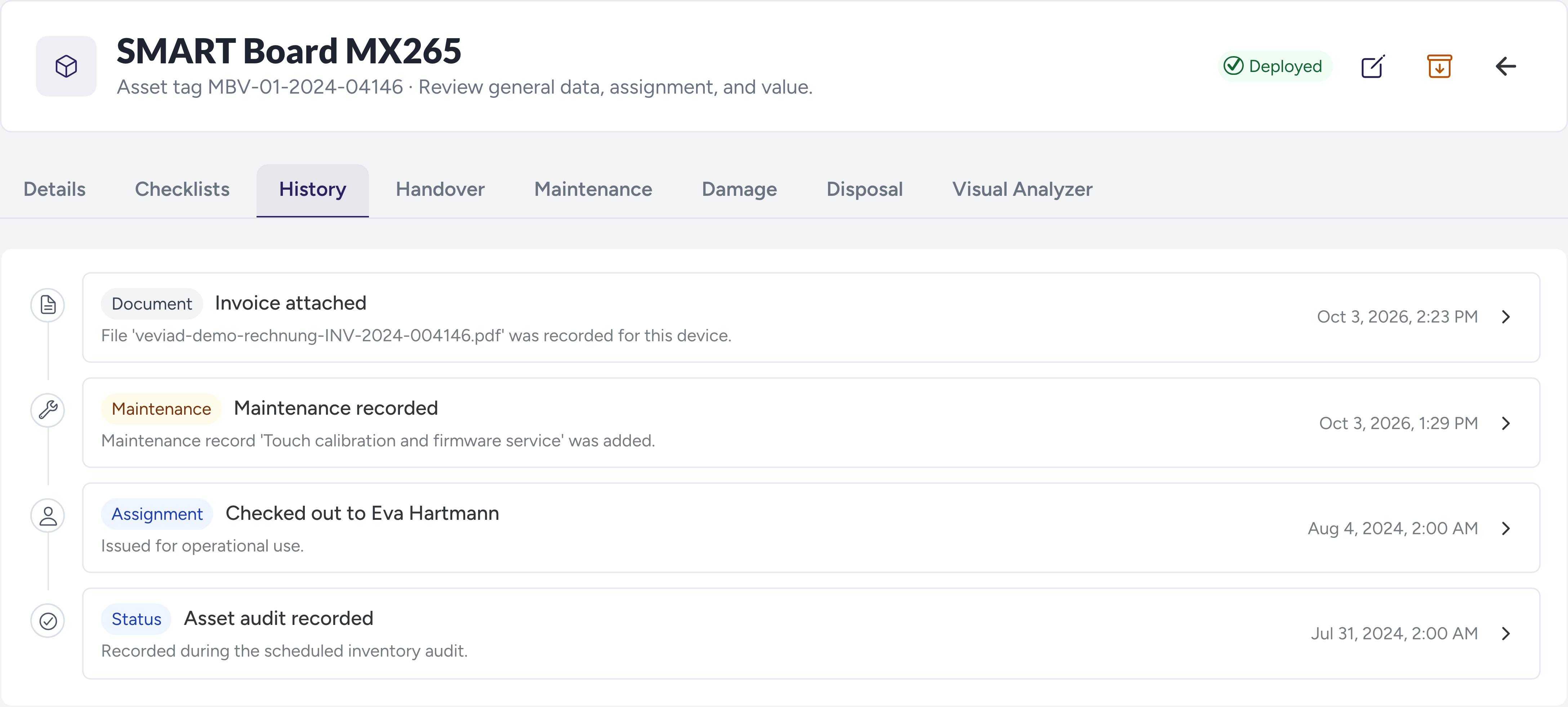 Veviad asset history showing recorded assignment, inventory audit, maintenance and an attached example invoice